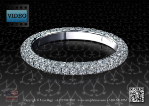 Diamond wedding band featuring three rows of micro pave by Leon Mege.