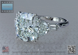 Five stone platinum engagement ring with 6 carat cushion diamond by leon mege