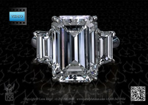 Three stone emerald cut diamond engagement ring by Leon Megé.