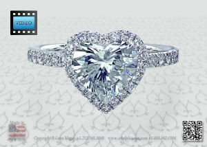 Micro pave halo ring with heart shaped diamonds by craftsman and designer Leon Mege
