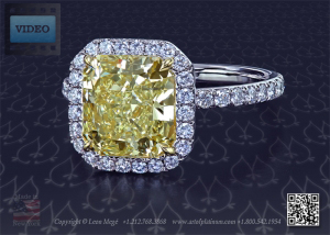 fancy yellow diamond in a halo solitaire engagement ring by leon mege