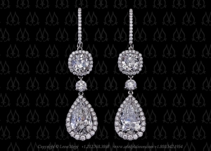 Custom made antique cushion earrings by Leon Mege