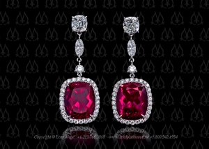 Rubelite tourmaline earrings by Leon Mege