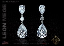 Pear shaped diamond drop earrings by Leon Megé
