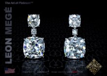 Drop earrings featuring antique cushion cut diamonds by Leon Megé