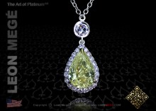 Halo pendant featuring a pear shaped yellow diamond by Leon Megé