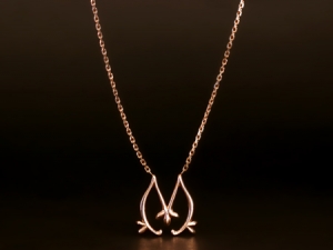 Leon Mege logo rose gold pendant on a chain