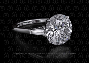 Three stone round diamond engagement ring by Leon Mege.