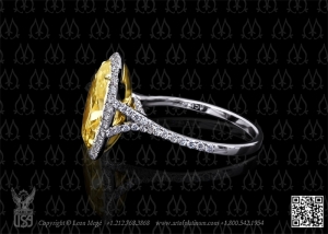 Yellow diamond engagement ring by Leon Mege