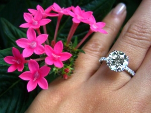 Engagement ring with round diamond and micro pave solitaire by Leon Mege