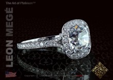 Antique cushion diamond halo ring by Leon Mege