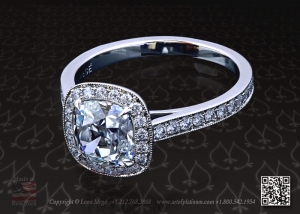 Cushion cut diamond halo engagement ring by Leon Mege