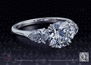 Three stone ring with round idea cut diamond and pear shapes by leon mege