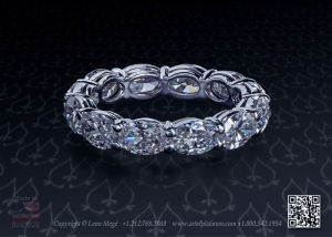 Oval diamond eternity wedding band by Leon Megé