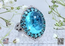 Electric Blue Paraiba Cabochone in an Award Winning Ring by Leon Mege.