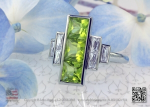 Peridots and french cut diamonds in a unique right hand ring by Leon Mege