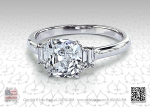 Three stone antique cushion engagement ring by Leon Megé