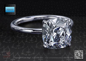 True antique cushion diamond set in a platinum solitaire engagement ring by leon mege