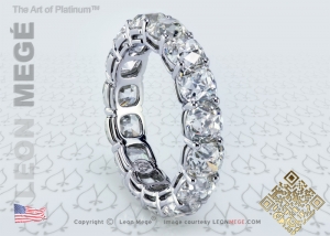 antique cushion diamonds eternity shared prongs wedding band in platinum by Leon Mege