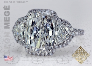 Three stone cushion cut diamond ring by Leon Mege