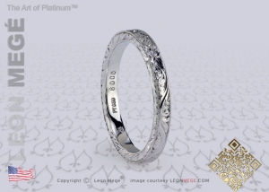 Engraved platinum wedding band by Leon Megé