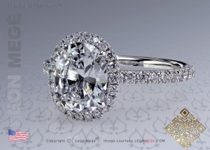 Oval diamond halo engagement ring by Leon Megé