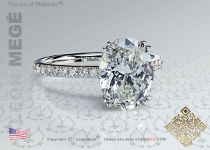 Oval diamond solitaire engagement ring with micro pave by Leon Mege.