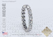 Stolen wedding band 3 mm wide with ideal cut round diamonds set eternity style by Leon Mege
