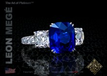  three-stone ring, featuring 6.18 carat cushion blue sapphire.