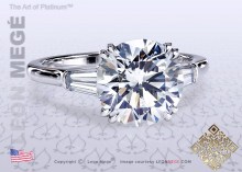 Three-stone ring, featuring 3.03 carat round diamond by Leon Mege.