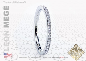 Eternity wedding band with diamond pave and millgrain edge by Leon Mege