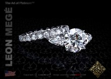 Three-stone ring, featuring 3.29 carat round diamond by Leon Mege.