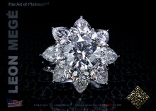 cluster ring, featuring 2.52 carat round diamond and pear shape diamonds