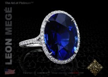 Custom make statement ring, featuring 10 carat oval cut blue sapphire set in hand forged platinum by Leon Mege.