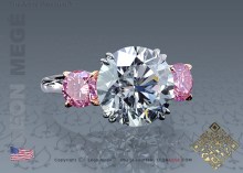 Three-stone ring, featuring 4.52 carat round diamond by Leon Mege.