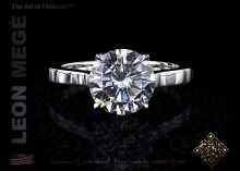  Sleek solitaire engagement ring, featuring a 2.00 carat round diamond in hand forged platinum by Leon Megé