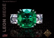  three-stone ring, featuring 10.53 carat cushion green emerald.