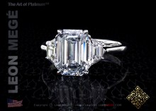 Elegant three stone engagement ring with an emerald cut diamond by Leon Megé