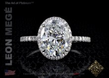 Halo engagement ring featuring an oval cut diamond by Leon Mege.