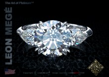 Three stone diamond ring featuring a 2.62 carat round diamond by Leon Mege