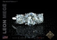 Three stone Old European cut diamond engagement ring by Leon Megé.