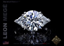 Three stone diamond ring featuring a 5 carat Ultimate cut diamond by Leon Mege.