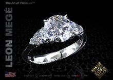 Three stone modern engagement ring with a 2.09 carat K/VVS2 round cut diamond by Leon Megé