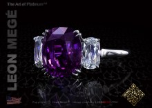 Three stone ring highlighting a natural cushion cut fuchsia sapphire by Leon Megé