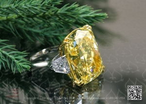 Yellow diamond three stone engagement ring by Leon Mege