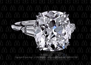 Three stone cushion cut diamond ring by Leon Mege